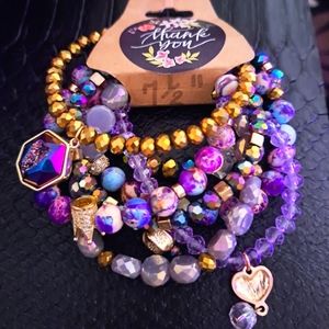 Purple and gold bracelets